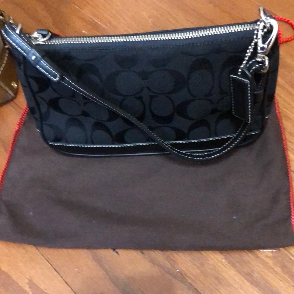 Coach mini purse. Used but good condition